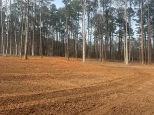 Prepared 4-acre site in Olde Creedmoor neighborhood in North Raleigh, NC after grading and raking before Bermuda hydroseeding application